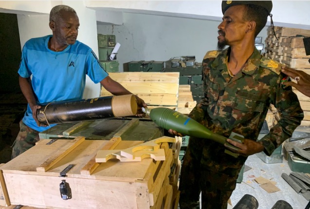 Sudanese fighter with mounted antiaircraft weapon during conflict